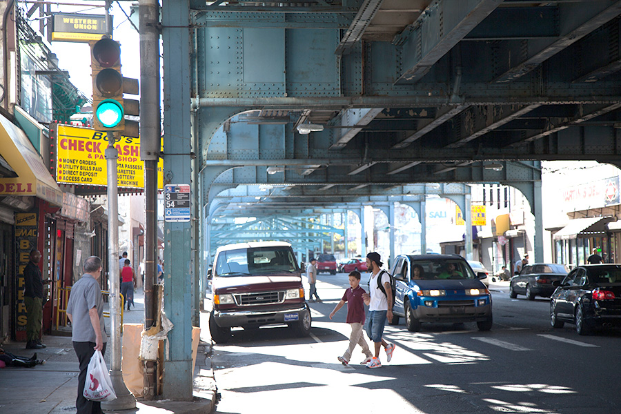 View of street beneath elevated transit line in Kensington neighborhood of Philadelphia