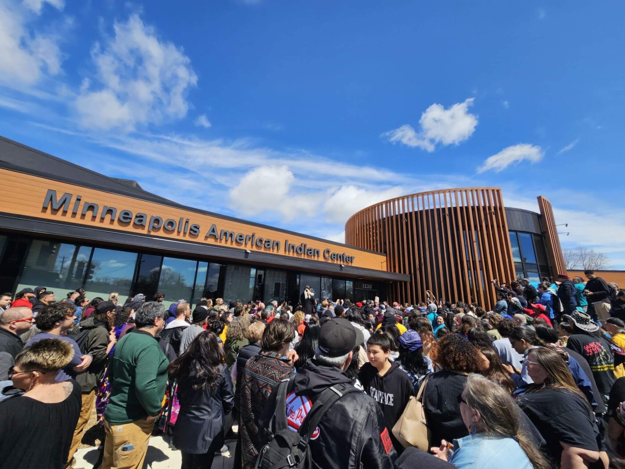 A large crowd gathers for an event outside the Minneapolis American Indian Center. Credit Hennepin County